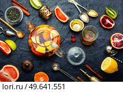 Moroccan tea, tea kettle with grapefruit, orange, lime and mandarin.. Fruit tea with citrus. Стоковое фото, агентство Ingram Publishing / Фотобанк Лори