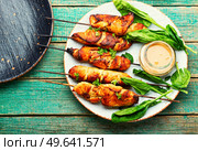 Roasted chicken meat. Chicken breast on a skewer. Meat kebab or shashlik with peanut sauce.. Chicken breast skewers, chicken satay. Стоковое фото, агентство Ingram Publishing / Фотобанк Лори