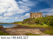 Dunvegan castle on the Isle of Skye - the seat of the MacLeod of MacLeod, Scotland. Dunvegan castle on the Isle of Skye, Scotland. Стоковое фото, агентство Ingram Publishing / Фотобанк Лори