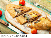 Delicious mackerel fish baked in dough. Scomber fish baked in dough. Стоковое фото, агентство Ingram Publishing / Фотобанк Лори