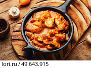 Fried meat with mushrooms, beef stroganoff from pork. Russian cuisine. Beef stroganoff with mushrooms in a creamy sauce. Стоковое фото, агентство Ingram Publishing / Фотобанк Лори