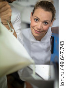 work inside a cheese production plant. Стоковое фото, агентство Ingram Publishing / Фотобанк Лори
