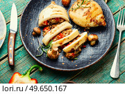 Appetizing grilled squids with vegetable stuffing. Roasted filled squid. Mediterranean dish. Grilled squid with vegetables, stuffed calamari. Стоковое фото, агентство Ingram Publishing / Фотобанк Лори