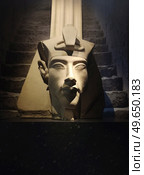 bust of pharaoh Echnaton (Akhenaten, aka Amenhotep IV) around black background . . Стоковое фото, агентство Ingram Publishing / Фотобанк Лори