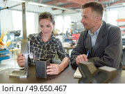 final assembly of electric objects by skilled industrial workers. Стоковое фото, агентство Ingram Publishing / Фотобанк Лори