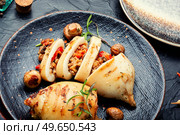 Tasty grilled squids with vegetable stuffing. Stuffed calamari. Seafood, mediterranean food. Stuffed calamari squid. Стоковое фото, агентство Ingram Publishing / Фотобанк Лори