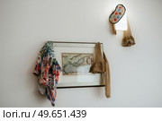 lingerie and parts of the toilet in the picture on the white wall after the party. Стоковое фото, агентство Ingram Publishing / Фотобанк Лори