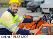 portrait of happy engineer and vehicle concept. Стоковое фото, агентство Ingram Publishing / Фотобанк Лори