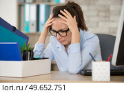 fired young woman feeling helpless. Стоковое фото, агентство Ingram Publishing / Фотобанк Лори