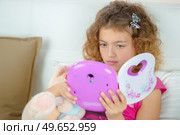 a female child is playing. Стоковое фото, агентство Ingram Publishing / Фотобанк Лори