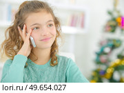 a happy child on the phone. Стоковое фото, агентство Ingram Publishing / Фотобанк Лори