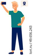 Selfie concept with young man standing and make self portrait with mobile phone camera in flat style. Guy communicates on video conference call using smartphone., taking pictures of himself on phone. Selfie concept with young man standing and make self portrait with mobile phone camera in flat style. Стоковая иллюстрация, агентство Ingram Publishing / Фотобанк Лори