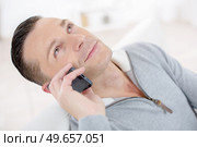 handsome man with a phone. Стоковое фото, агентство Ingram Publishing / Фотобанк Лори