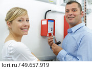 team of coworkers and firefighter teaching. Стоковое фото, агентство Ingram Publishing / Фотобанк Лори