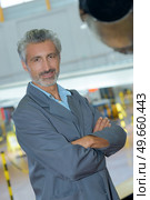 portrait of aerospace engineer posing. Стоковое фото, агентство Ingram Publishing / Фотобанк Лори