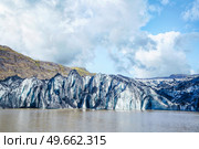 Icelandic glacier with a small lake filled with melting water in the summer. Стоковое фото, агентство Ingram Publishing / Фотобанк Лори