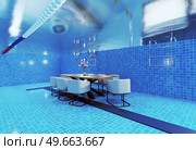 underwate living interior in the swiming pool. 3d creative concept illustration. underwate living interior in the swiming pool. Стоковое фото, агентство Ingram Publishing / Фотобанк Лори