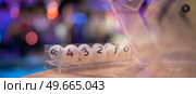 white balls with numbers for the game of lottery. Стоковое фото, агентство Ingram Publishing / Фотобанк Лори