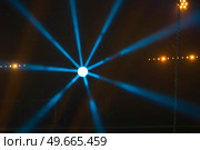 rays of light illuminate the scene at the concert. Стоковое фото, агентство Ingram Publishing / Фотобанк Лори