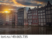 Traditional old buildings in Amsterdam, the Netherlands. Стоковое фото, агентство Ingram Publishing / Фотобанк Лори