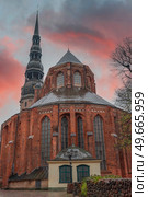 Riga Church of St. Peter and the streets of the ancient city. Стоковое фото, агентство Ingram Publishing / Фотобанк Лори