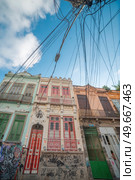 Popular bohemian area of ??Santa Teresa in Rio de Janeiro. Historic buildings are painted with graffiti. Стоковое фото, агентство Ingram Publishing / Фотобанк Лори