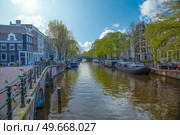 Traditional old buildings in Amsterdam, the Netherlands. Стоковое фото, агентство Ingram Publishing / Фотобанк Лори