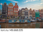 Traditional old buildings in Amsterdam, the Netherlands. Стоковое фото, агентство Ingram Publishing / Фотобанк Лори