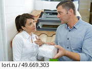 store manager with warehouseman checking goods reception. Стоковое фото, агентство Ingram Publishing / Фотобанк Лори