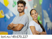 man and woman personal trainers in the gym. Стоковое фото, агентство Ingram Publishing / Фотобанк Лори