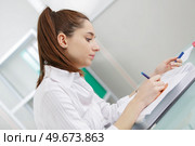 a young author writing a story. Стоковое фото, агентство Ingram Publishing / Фотобанк Лори