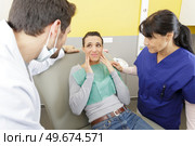 scared patient in dentist consultation. Стоковое фото, агентство Ingram Publishing / Фотобанк Лори