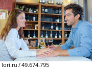a couple is drinking good wine. Стоковое фото, агентство Ingram Publishing / Фотобанк Лори