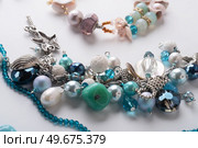 author  braceletes with pearls and gemstones. fashion and jewelry concept. Стоковое фото, агентство Ingram Publishing / Фотобанк Лори
