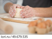 hands are working on the dough. Стоковое фото, агентство Ingram Publishing / Фотобанк Лори