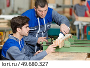 man as a wood apprentice. Стоковое фото, агентство Ingram Publishing / Фотобанк Лори