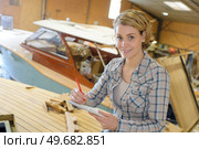 boat estimator doing her estimation. Стоковое фото, агентство Ingram Publishing / Фотобанк Лори