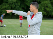 a referee on football field. Стоковое фото, агентство Ingram Publishing / Фотобанк Лори