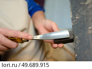 Closeup of chisel on wood. Стоковое фото, агентство Ingram Publishing / Фотобанк Лори