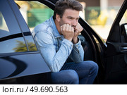 man feeling pain to the neck after a car crash. Стоковое фото, агентство Ingram Publishing / Фотобанк Лори