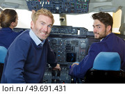 man and woman pilots flying. Стоковое фото, агентство Ingram Publishing / Фотобанк Лори