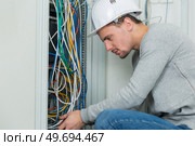 looking for the right wire. Стоковое фото, агентство Ingram Publishing / Фотобанк Лори