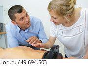 woman on rescue training course. Стоковое фото, агентство Ingram Publishing / Фотобанк Лори