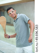 young man playing pelote basque. Стоковое фото, агентство Ingram Publishing / Фотобанк Лори