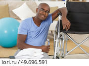 sportsman in wheelchair at indoors. Стоковое фото, агентство Ingram Publishing / Фотобанк Лори