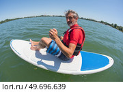 man taking a break from stressing city life. Стоковое фото, агентство Ingram Publishing / Фотобанк Лори