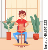Teenage boy creative hobby pottery. Male professional ceramist making pot on workshop, crockery and other ceramics at pottery. Man enjoying handicraft hobby. Potter working with craft pottery wheel. Teenage boy creative hobby pottery. Male professional ceramist making pot, ceramics at pottery. Стоковая иллюстрация, агентство Ingram Publishing / Фотобанк Лори
