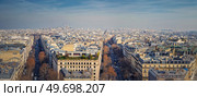 Aerial Paris cityscape panorama with view to Sacre Coeur Basilica of the Sacred Heart, France. Beautiful parisian architecture, historic buildings and landmarks on the horizon. Стоковое фото, агентство Ingram Publishing / Фотобанк Лори