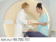 patient undergoing mri scan at hospital. Стоковое фото, агентство Ingram Publishing / Фотобанк Лори