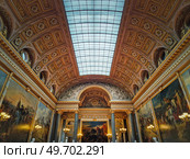 Beautiful architectural details of the Gallery of Great Battles in the palace of Versailles, France. The largest room in the castle, golden ornaments of the sun king Louis XIV. Стоковое фото, агентство Ingram Publishing / Фотобанк Лори